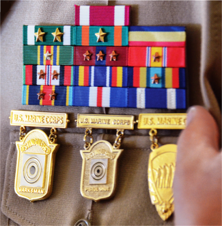 Badges being awarded to a person.
